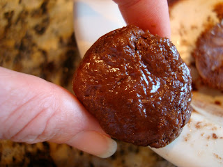 Hand holding peanut butter cocoa filling mixture