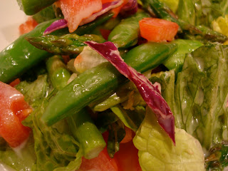 Green salad with vegetables served with Maple Ginger Dijon Vinaigrette