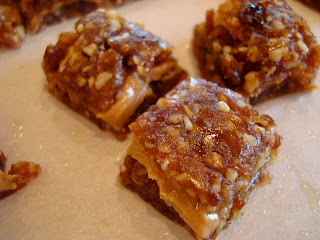 Three Nut Butter Filled Caramel Bites on parchment paper