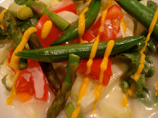 Salad with vegetables drizzled with Mustard