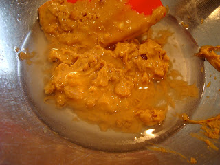 Peanut Butter and Coconut Oil in bowl with spatula