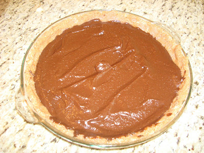 Raw Vegan Chocolate Pie in pie plate on countertop