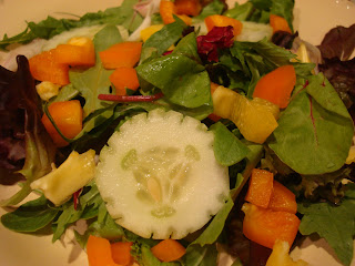 Mixed vegetable and green salad in white bowl