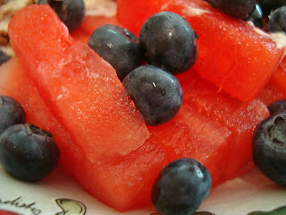 Sliced watermelon and blueberries close up