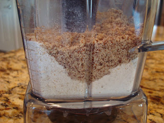 Ground oats and almond flour in blender