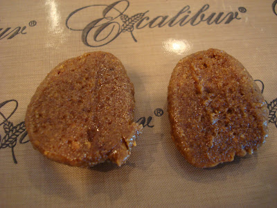 Underside of two High Raw Vegan Gingerbread Cookie Dough Balls