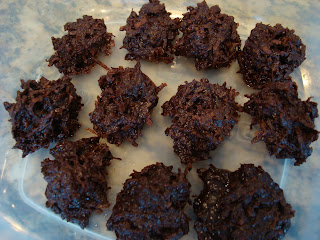 High Raw Vegan Chocolate Macaroons placed inside of clear container