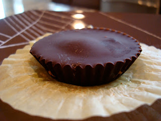 Side view of unwrapped Vegan Peanut Butter Cup