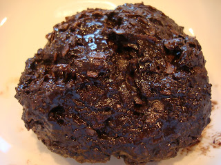 Raw Vegan Dark Chocolate Fudge Ball close up on plate