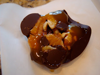 cut open chocolate turtle with caramel and popcorn
