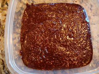 Stirred crust ingredients in bottom of clear container