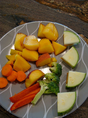 Various fruits and vegetables on plate