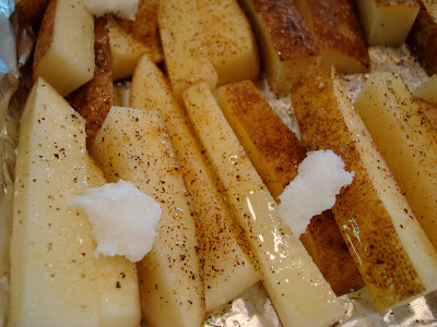 Close up of Coconut & Olive Oil Roasted Potato Sticks followed with coconut oil
