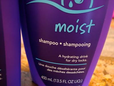 Close up of bottle of Aussie shampoo