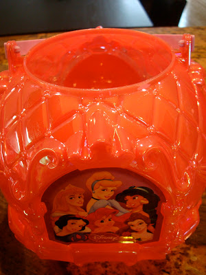 Close up of Disney Princess trick-or-treating container 