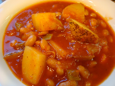 Close up of Hearty Vegan Southwestern Sweet & Spicy Soup in white bowl