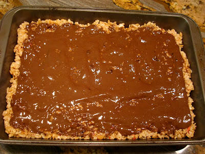 GF Vegan "Rice Krispie" Treats with Chocolate Peanut Butter Coconut Oil Frosting in baking pan