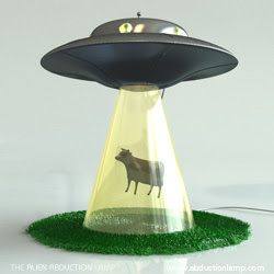 ovni abduciendo una vaca