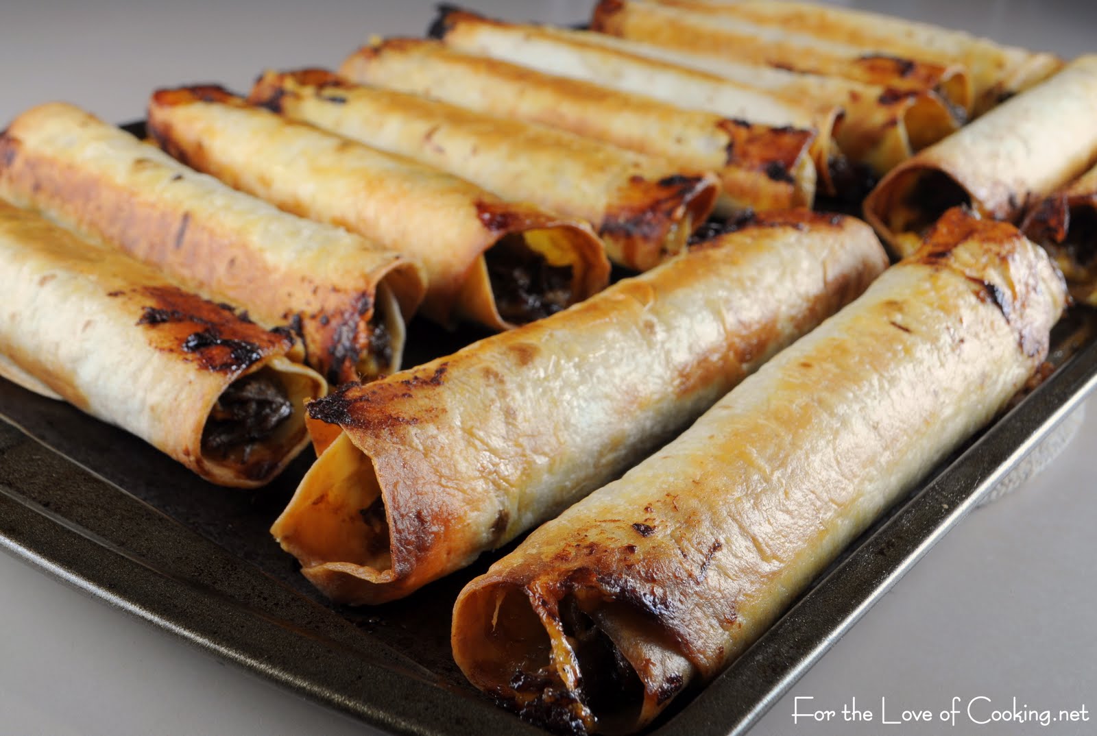 Shredded Beef and Cheddar Baked Flautas For the Love of Cooking