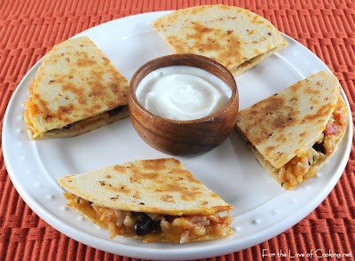 Mexican Tomato Rice and Bean Quesadilla with Sharp Cheddar and Sour Cream