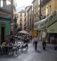 The narrow city streets lined with cafes