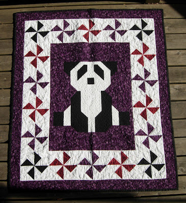 completed Purple Patchwork Panda quilt