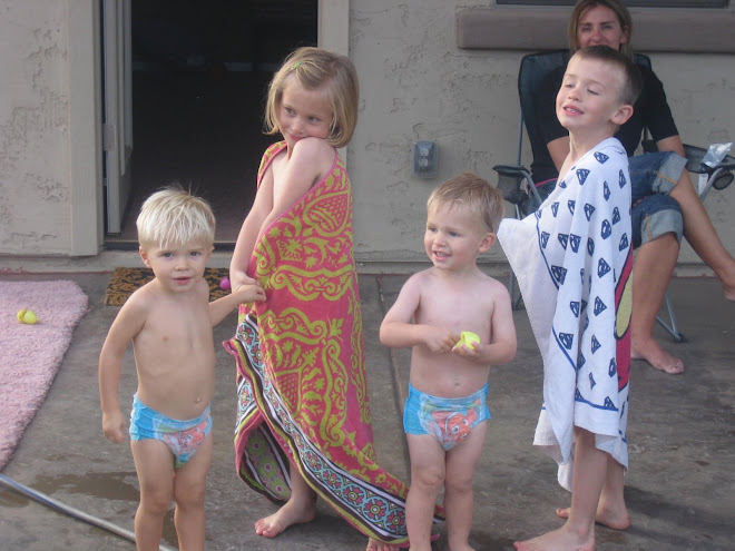 Playing in the sprinklers