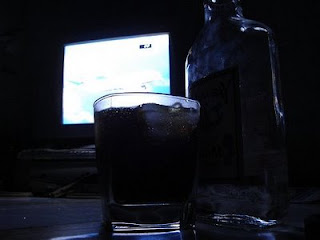 alcoholism glass and bottle