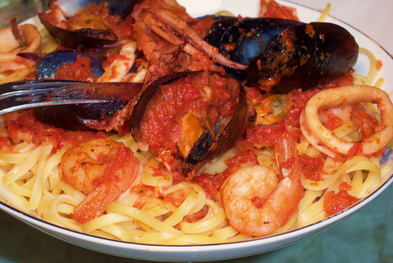 Mussels, Shrimp and Calamari over Linguine Pomodoro What's Cookin