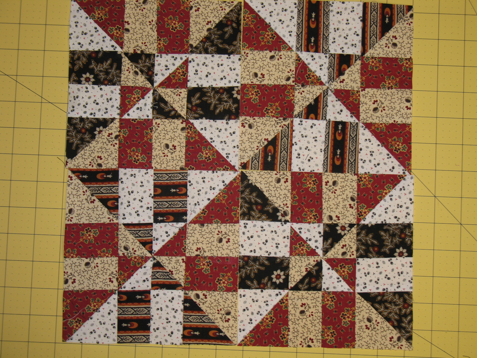 Welcome Home Farm: Pinwheel Disappearing 4-Patch quilt block