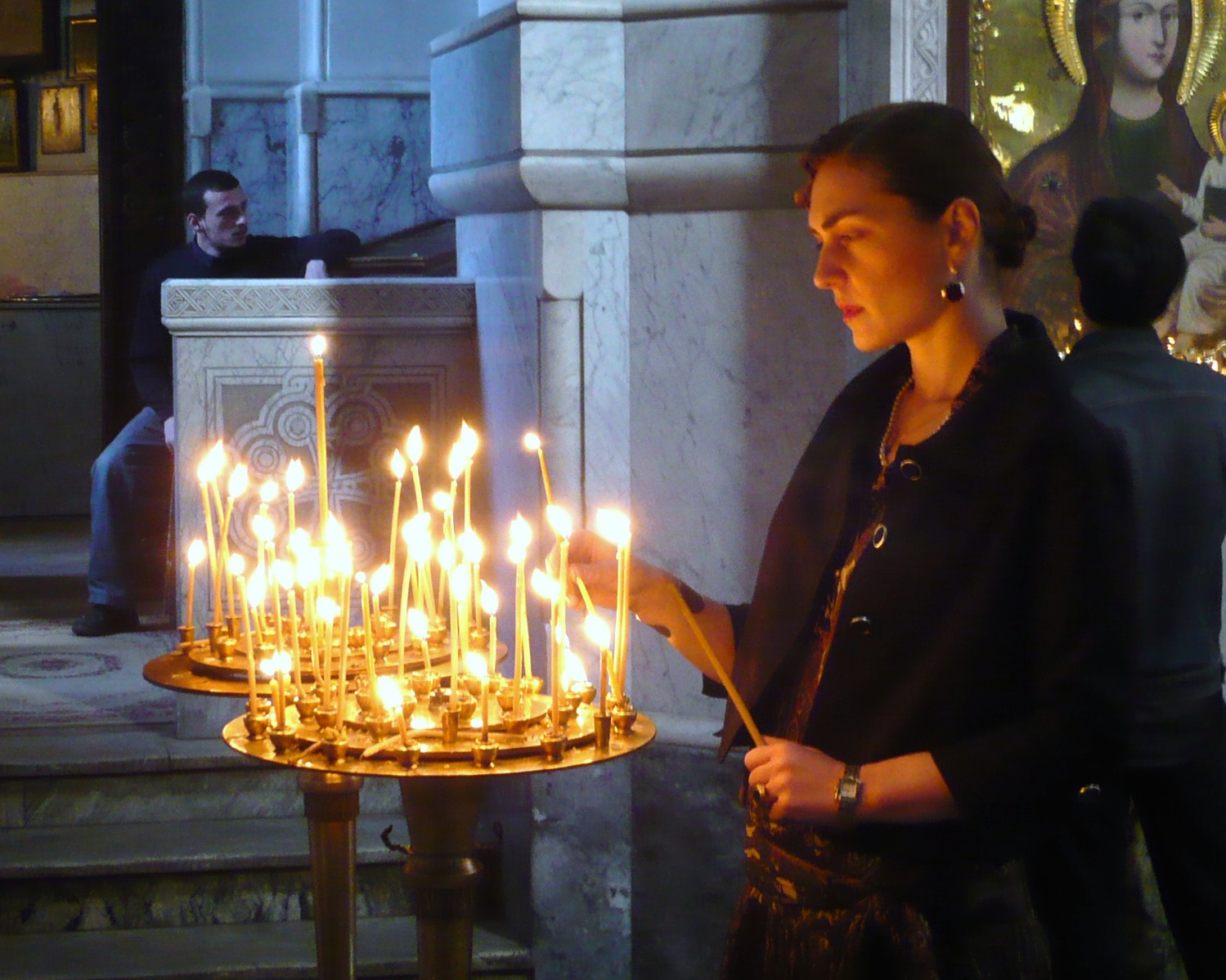 lighting candles woman church deaf identity journey tbilis georgia