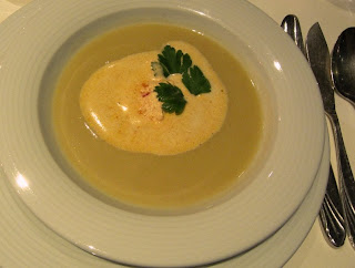 Soup with floating island of cream