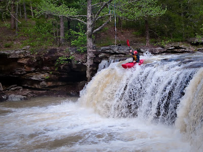 Kayakers going off Falling Water Fall