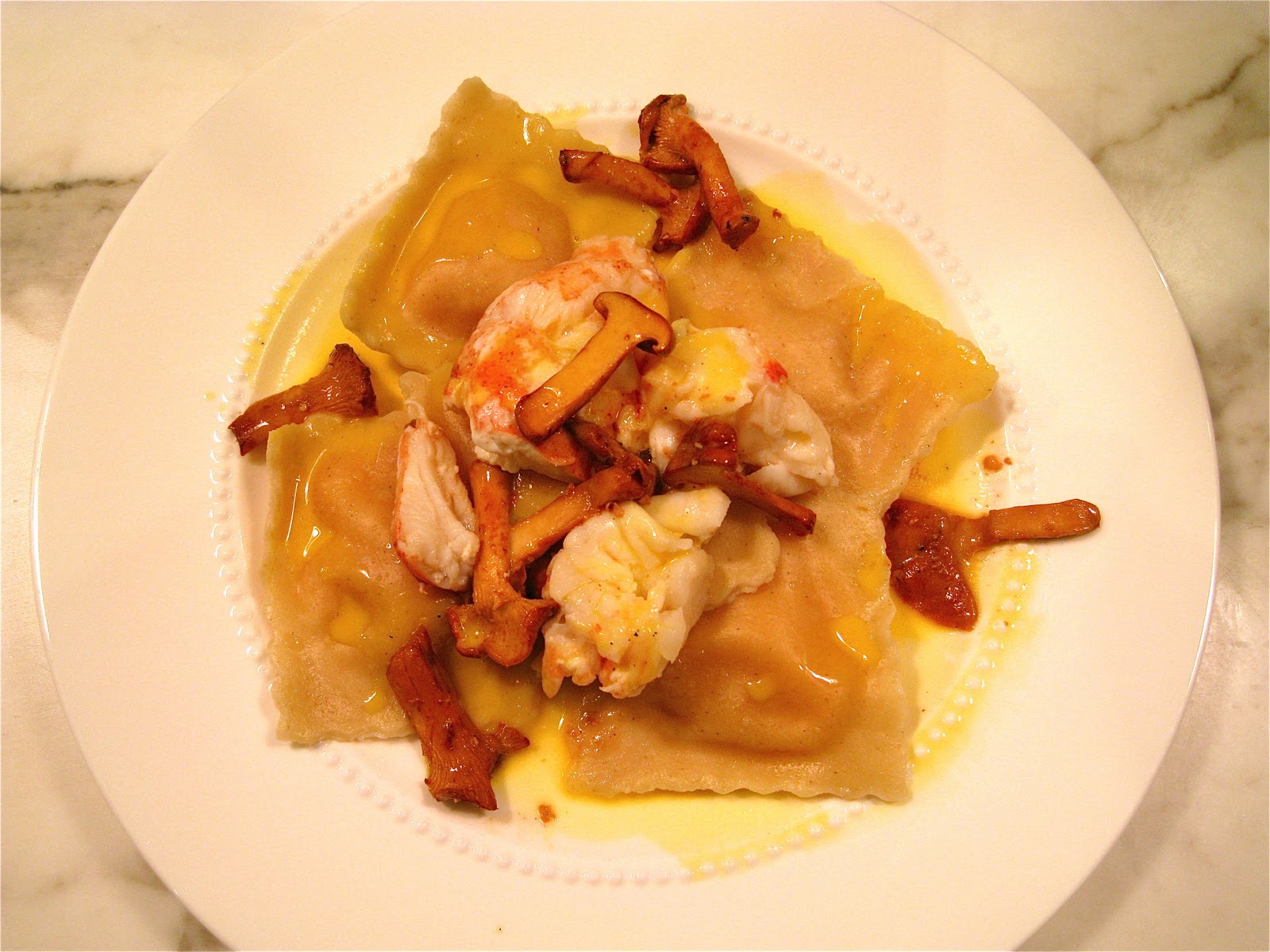 Butternut Squash Ravioli with Lobster and Vanilla Saffron Sauce