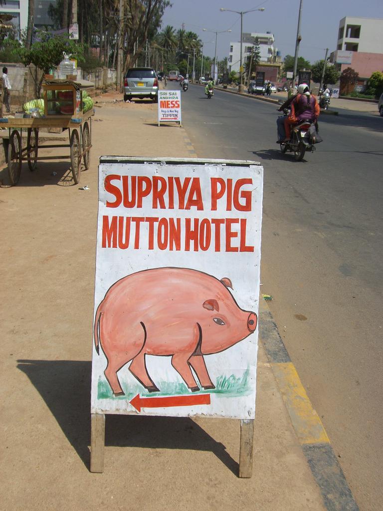 [pig+mutton+hotel+sandwich+board.jpg]