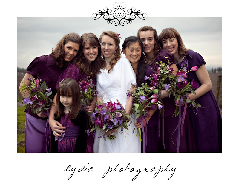 Bride and bridesmaids with flower girl at purple, winter wedding in Santa Rosa, California
