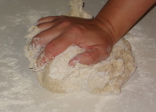 Knead by pressing with heel