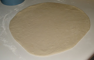 Roll dough into large circle