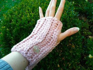 pink washable organic cotton crocheted fingerless gloves with buttons