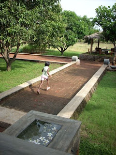 thilanka hotel and spa dambulla sri lanka child running on brick path