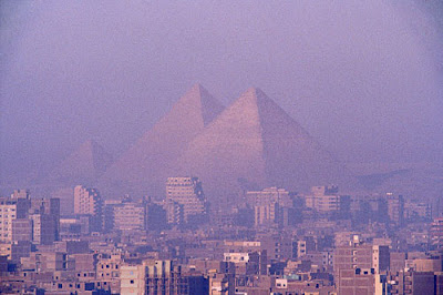 Giza pyramids soaring above the city Picture