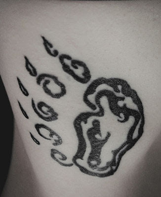 Paw Hip Bone Tattoo by PopFuzz