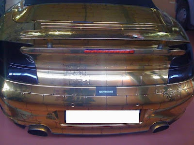 gold plated porsche
