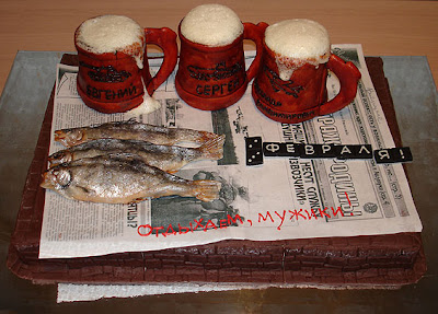 Cake made in shape of  beer mugs & fish