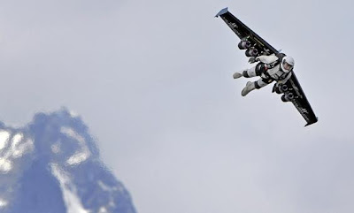 Man Flies Like A Bird Over The Alps With Jet-Propelled Wings (3) 1