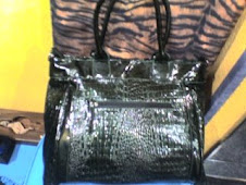 Bolso de polipiel verde pvp 15€