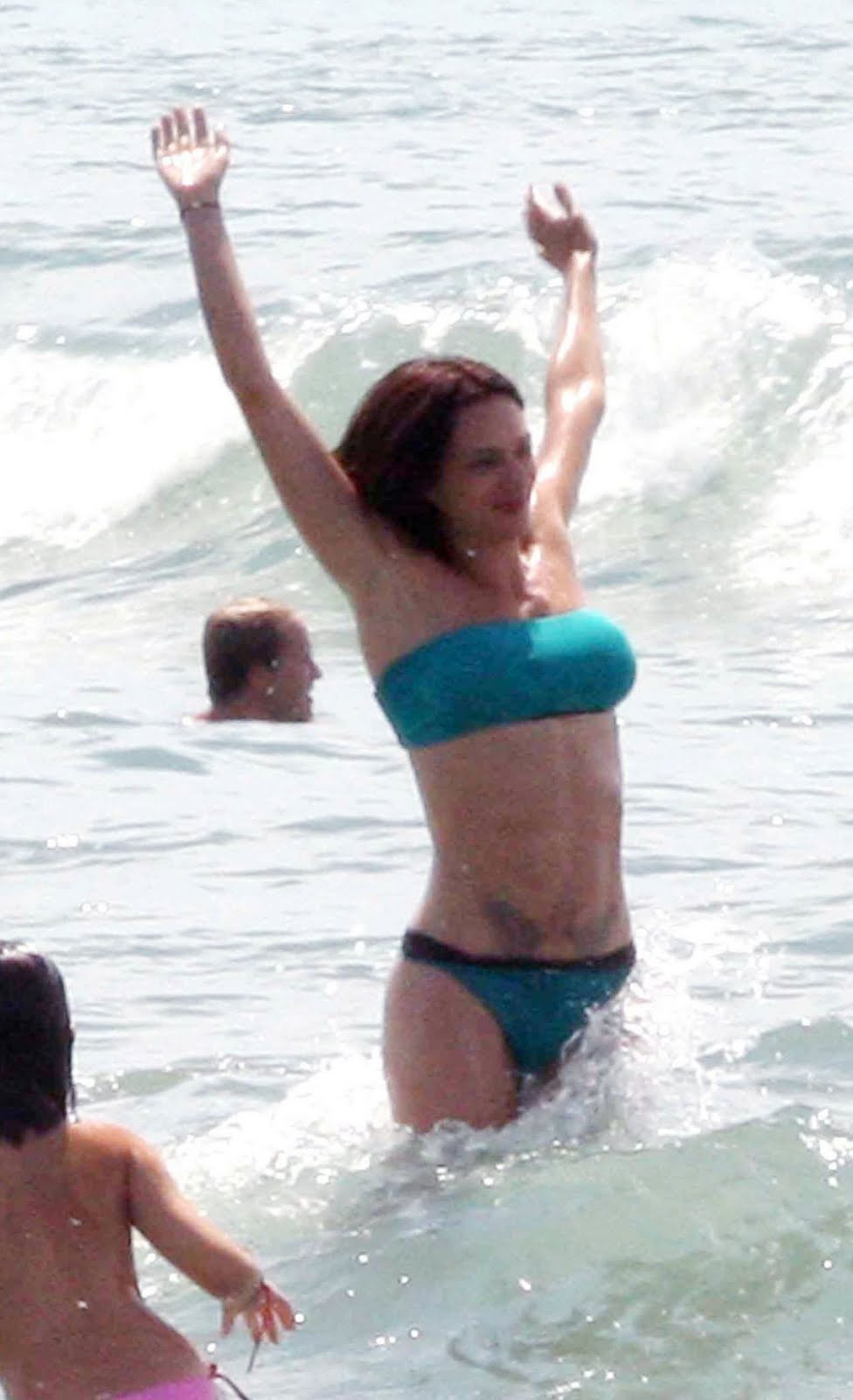 asia argento bikini images asia argento green bikini on a beach in forte asia argento bikini images asia argento green bikini on a beach in forte
