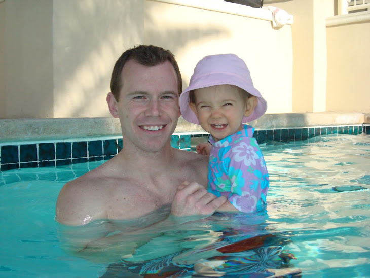 Cheese! Daddy was teaching me how to swim and kick my legs.
