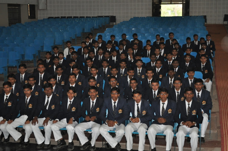 Cadets of Class XI & XII are listening to Ajeet Major General KS Kumbar, VSM, with rapt attention