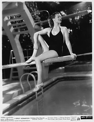 There is no such scene in the movie, but this publicity photo probably helped sell some tickets. Simone Simon